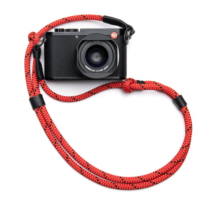 Poppy Leica Camera with lens and cover with a Adjustable Rope Strap attached with steel rings 