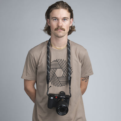 Photographer using Leica camera with COOPH Double Rope Camera Strap 
