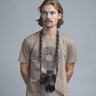 Photographer wearing Leica camera around the neck with Double Rope Camera Strap 