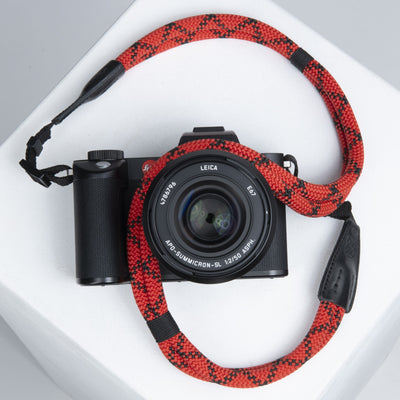 Leica Camera arranged with Double Rope Strap wrapped around the lens 