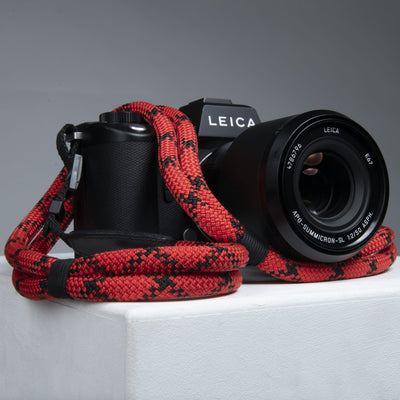 Leica Camera arranged with Double Rope Strap wrapped around the lens 