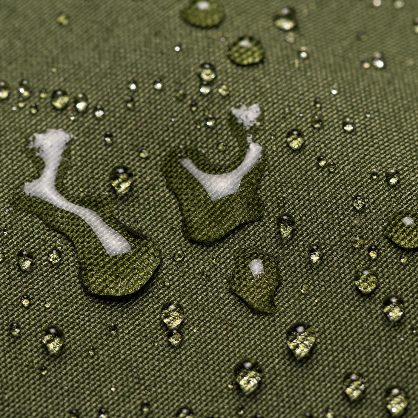 Closeup of the weatherproof cotton showing water beading on the surface 