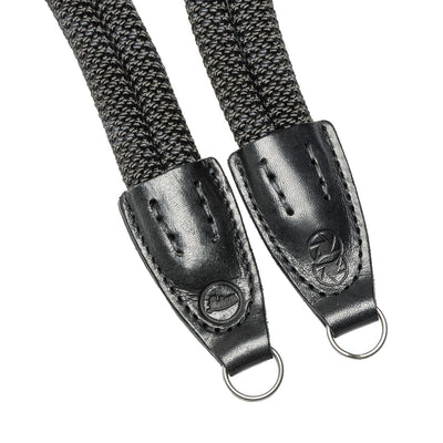 Leather ends of rope strap with steel ring and Leica embossing 