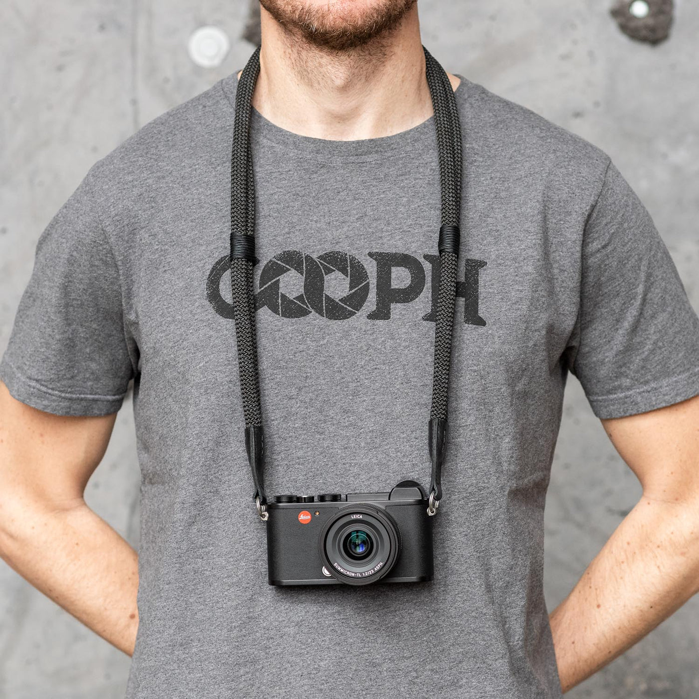 Photographer wearing Leica camera around the neck with Leica Double Rope Strap 
