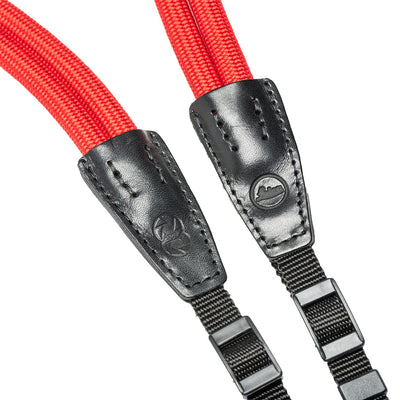 Webbing ends on red double rope strap 