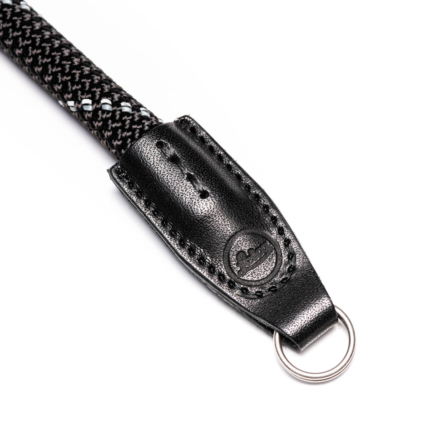 Leather ends of rope strap with steel ring and Leica embossing  