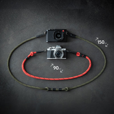 Leica and Olympus cameras with Adjustable Rope Straps, the Olympus camera has a red strap with 90 cm length the Leica Camera has green strap with 150 cm length 