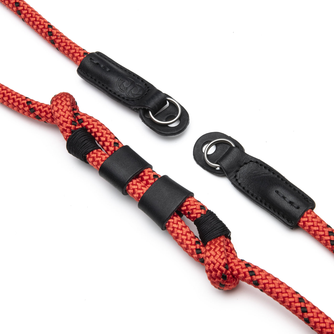 Adjustable Rope Strap showing the adjustable feature made from vegan leather and the ends with steel rings 