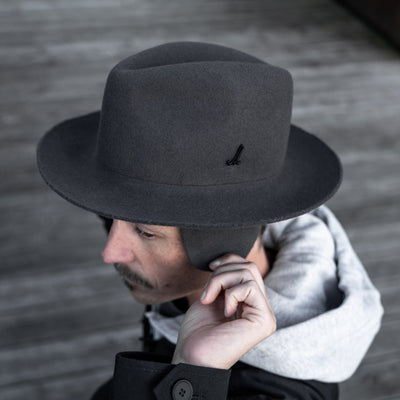 Photographer wearing the Cooph Tempest Hat by Mühlbauer in the anthracite colorway. 