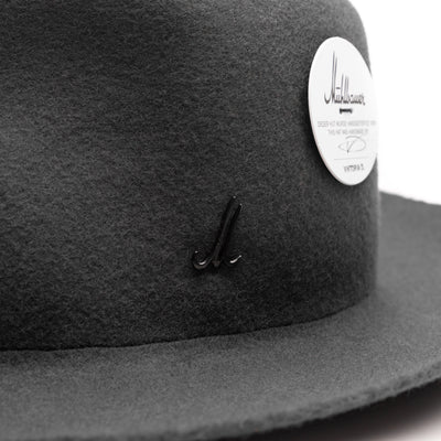 Close-up of the Mühlbauer pin which is attached on the side of the hat. 