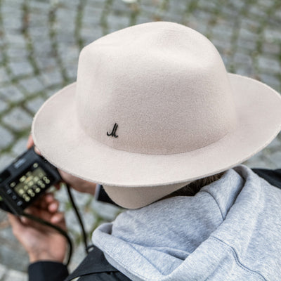 Photographer wearing the Cooph Tempest Hat by Mühlbauer in the birch colorway. 