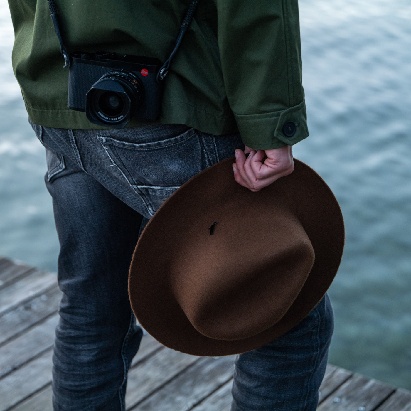 Photographer wearing the Cooph Tempest Hat by Mühlbauer in the gold colorway 