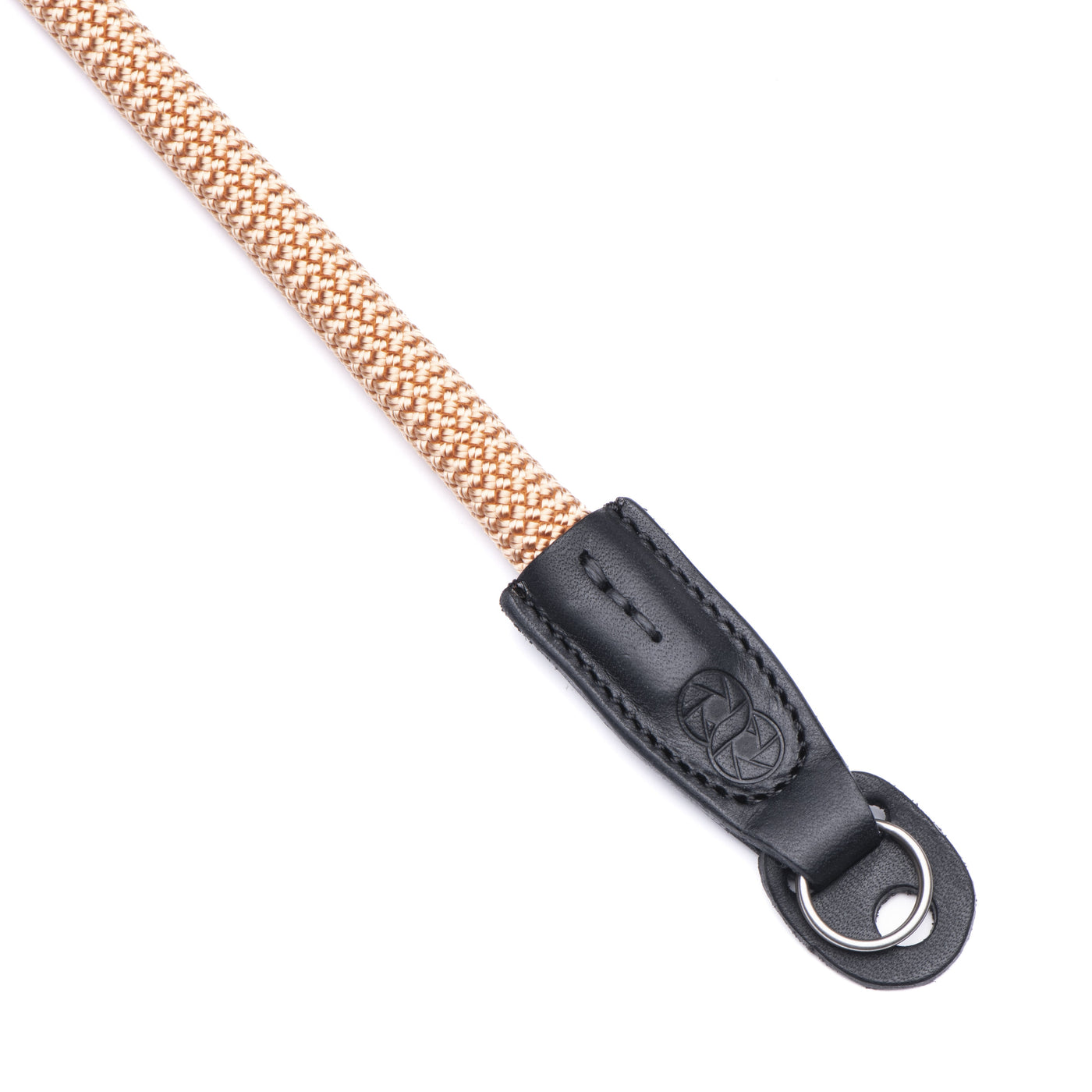 Leather ends of a peach rope strap with steel rings 