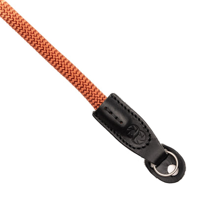 Closeup of the leather ending of the cooph rope camera strap  