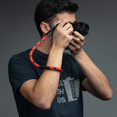 Photographer using Sony camera with COOPH Rope Camera Hand Strap 