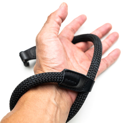 Photographer's wrist showing tightening method of Rope Hand Strap 