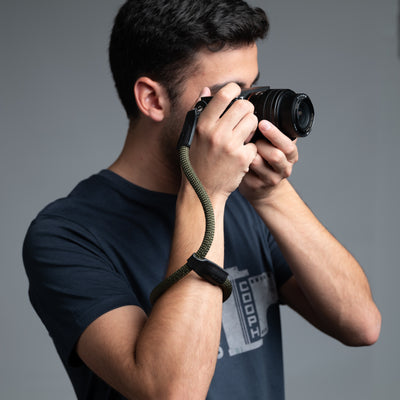Photographer using Sony camera with COOPH Rope Hand Strap 