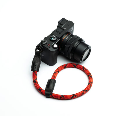 Rope Hand Strap attached to Sony Alpha camera with steel ring  