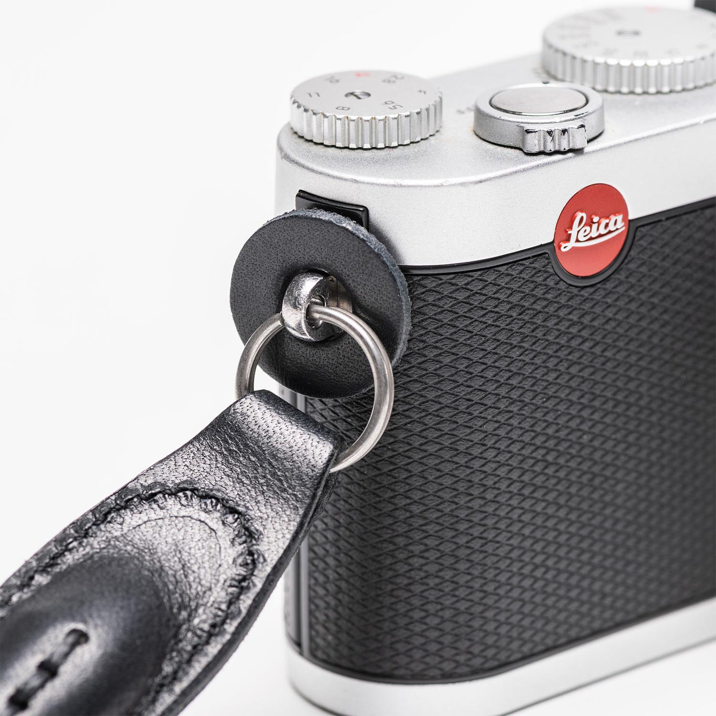 Rope strap attached to Leica camera with steel ring 