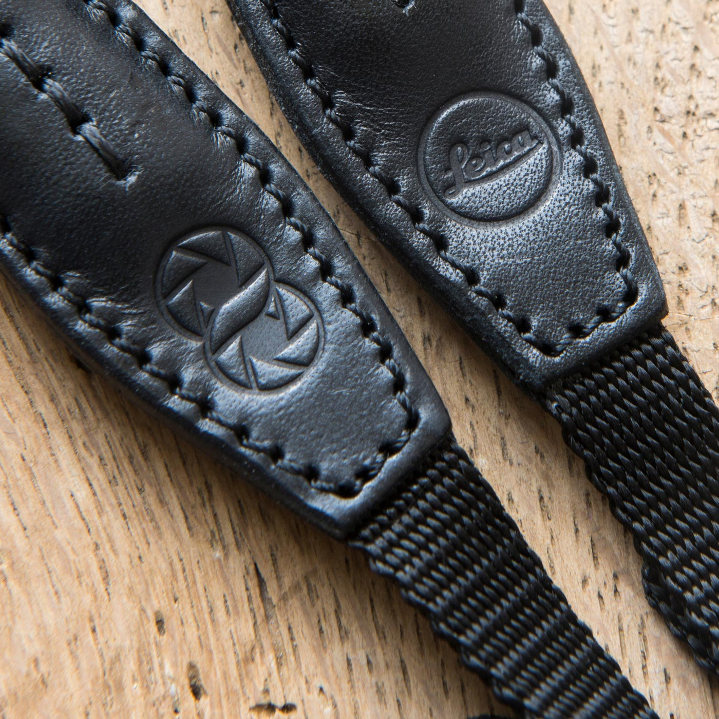 Leather ends of rope strap with webbing and Leica embossing oasisso